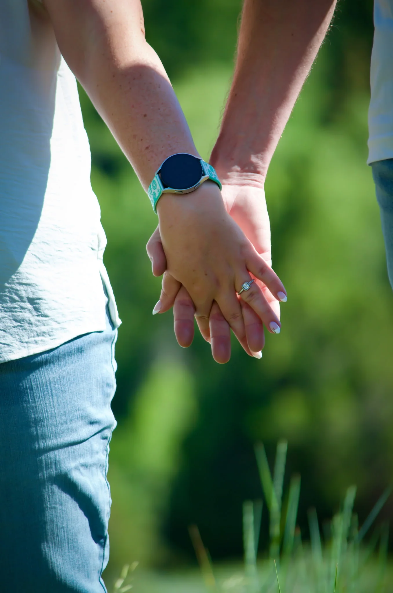 Tiff and Mitch holding hands