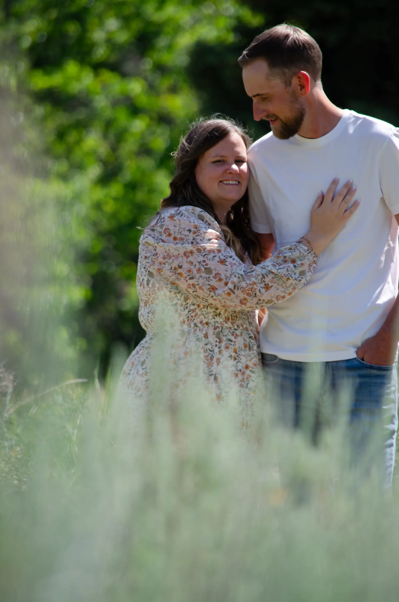 Tiff and Mitch leaning close together